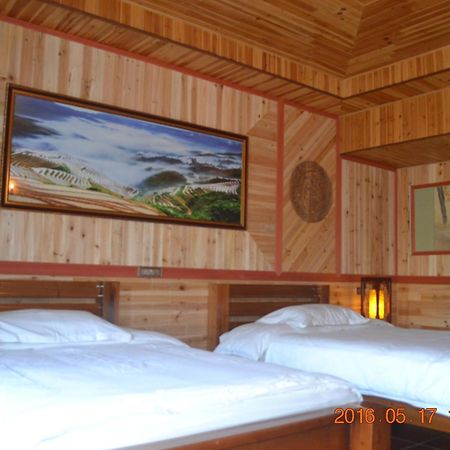 Longji Holiday Hotel Longsheng Quarto foto