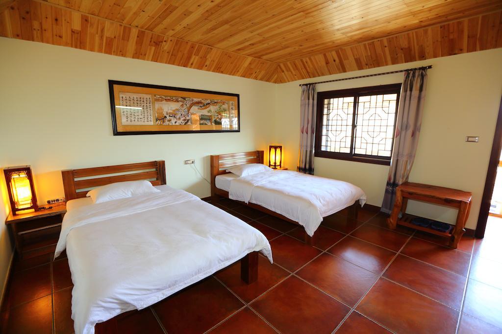 Longji Holiday Hotel Longsheng Quarto foto