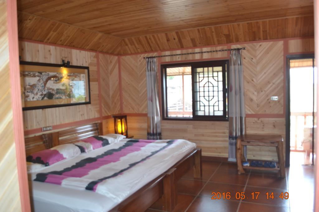 Longji Holiday Hotel Longsheng Quarto foto