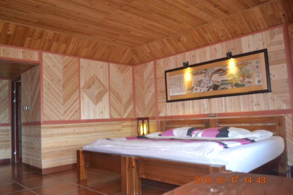 Longji Holiday Hotel Longsheng Quarto foto
